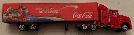 10339-1 € 5,00 coca cola vrachtwagen kerstman drinkend ca 18 cm.jpeg